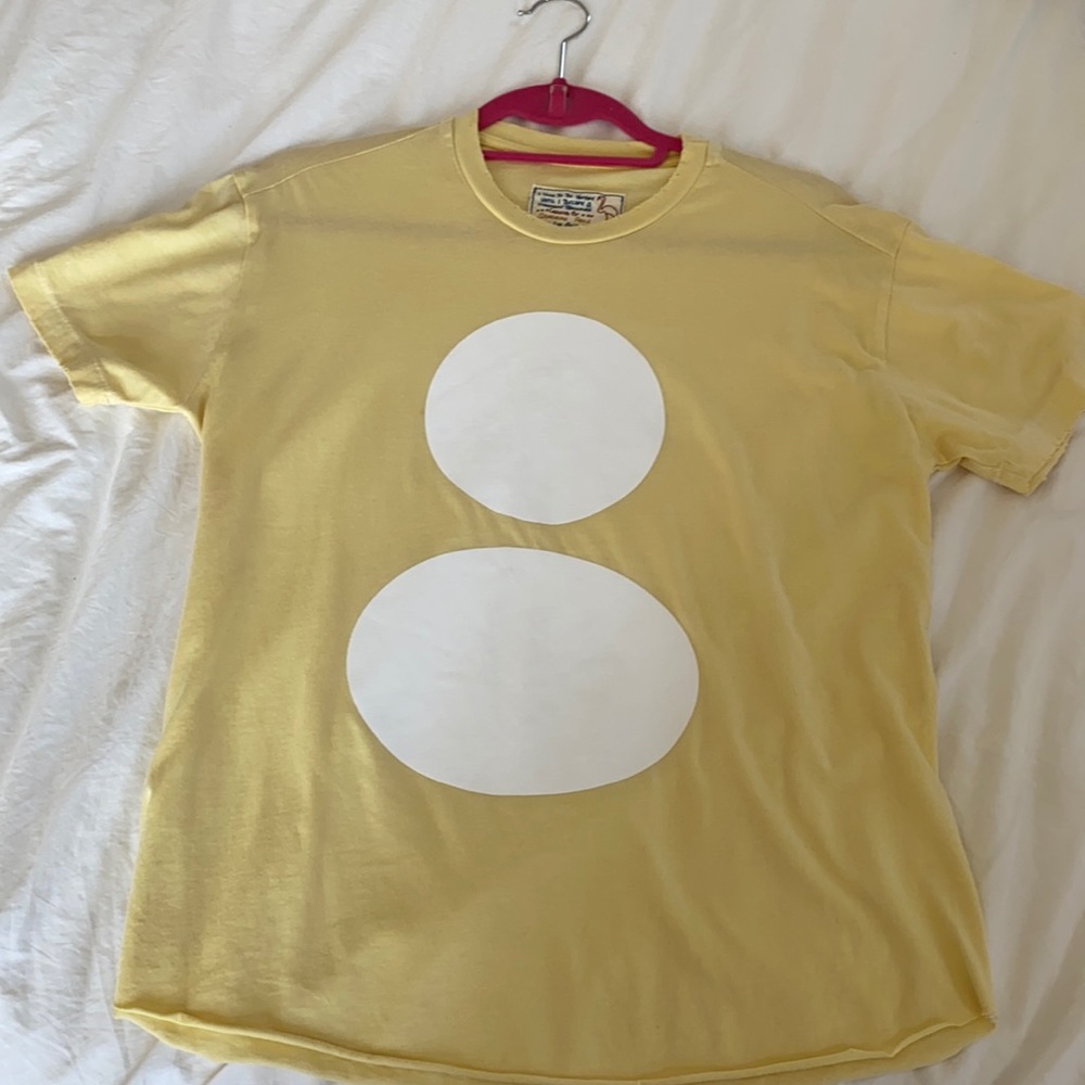 Yellow short sleeve top with two white circles